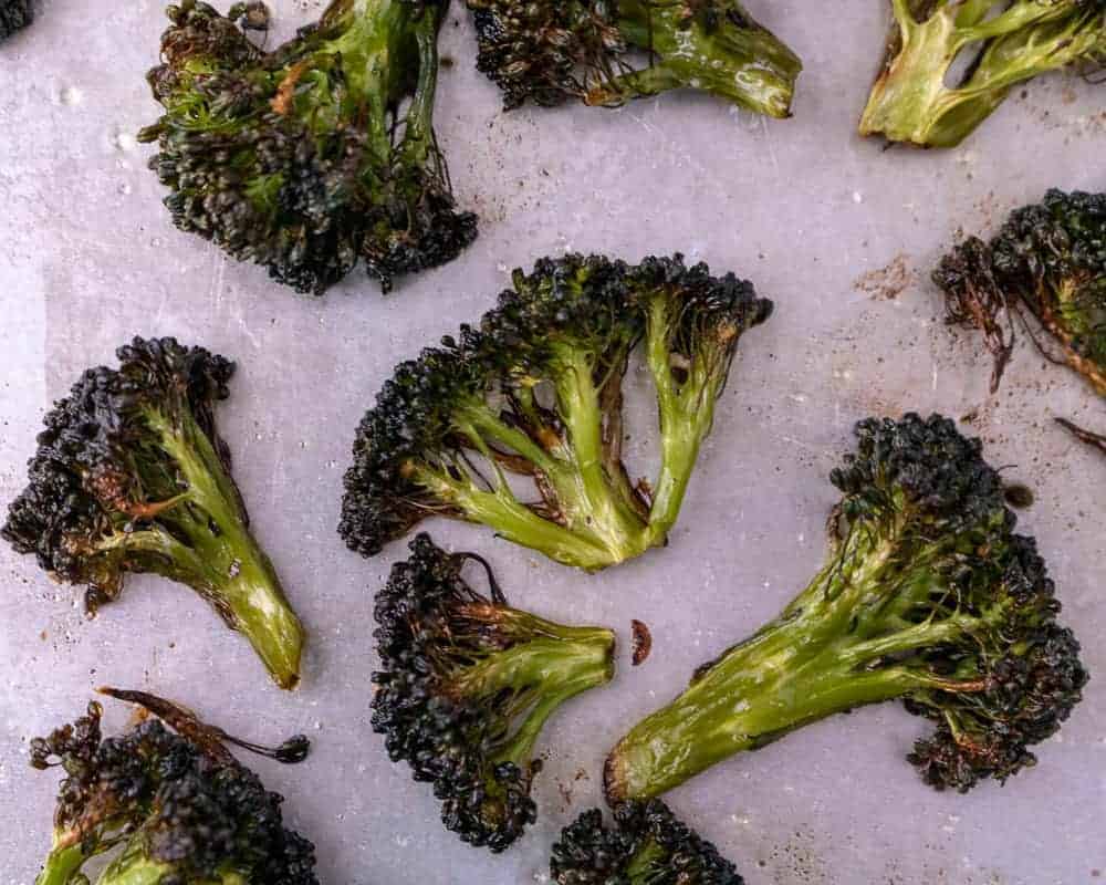 oven roasted broccoli close up on a sheet tray
