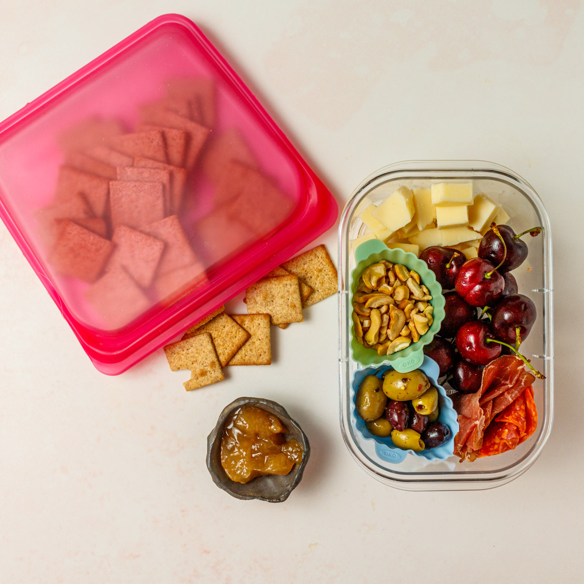 Close up of a one person cheese plate in a storage container