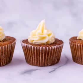 3 frosted carrot cake cupcakes