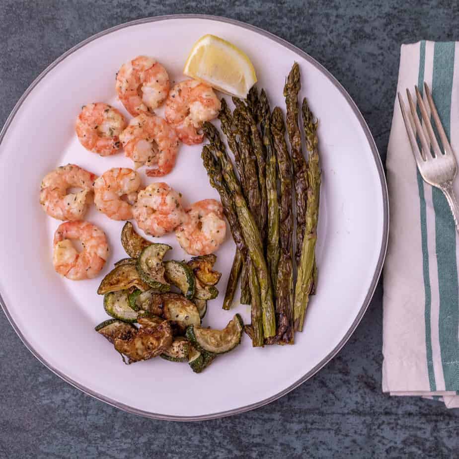 Garlic and parm shrimp with roasted asparagus and zucchini.