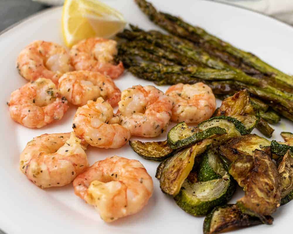 Garlic and parm shrimp with roasted asparagus and zucchini.