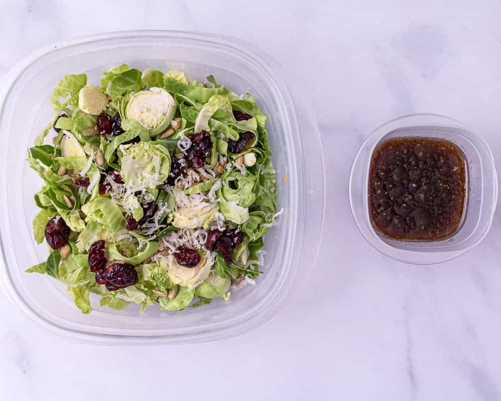 One close up of the shredded brussels sprout salad and dressing