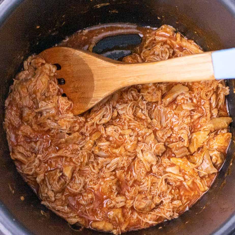 Close up of buffalo chicken in the pressure cooker
