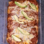 Close up of a plate of chicken enchiladas in the pan