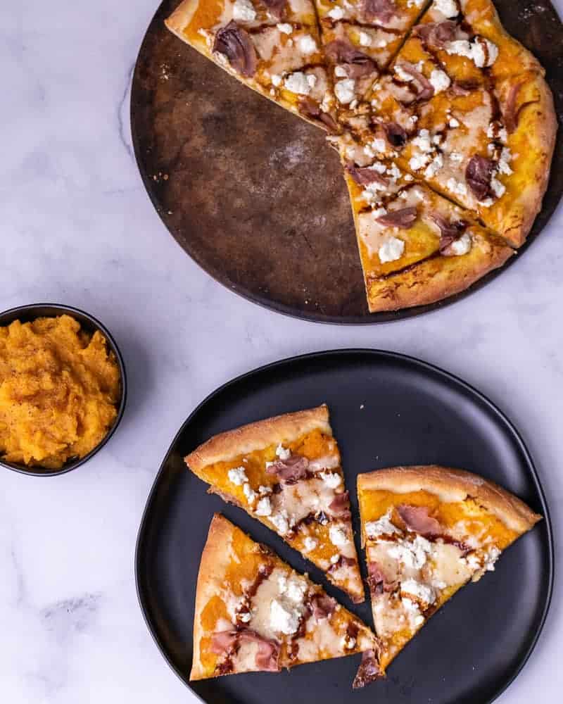 Up close slices of mashed butternut squash pizza