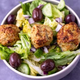 Close up of greek meatball salad.