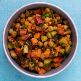 Overhead Shot of chickpea salad on a blue background