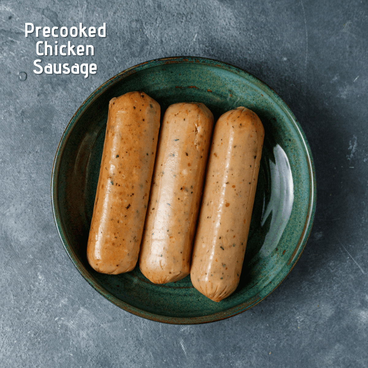 Raw ingredients on a blue background, labeled. Precooked chicken sausage on a blue plate.